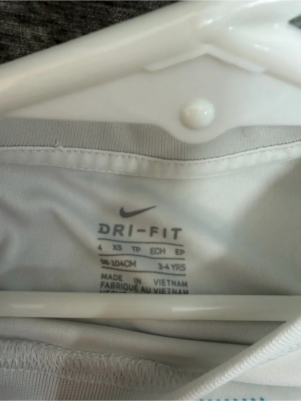 Nike White Short Sleeve Tee with Blue Graphic Logo